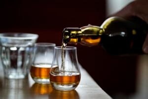 62c6b3f2b9a8aa953d3dd0db Pouring whisky 1